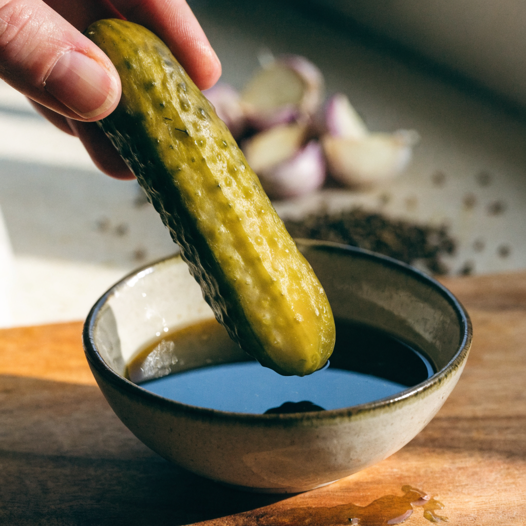 Close-up of refrigerator kosher dill pickles (claussen-style crisp)